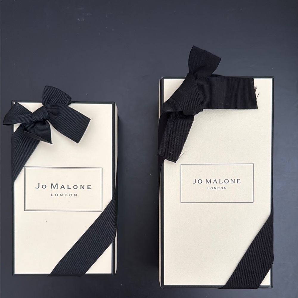 Two Jo Malone Cream color Gift Boxes with Black Ribbons